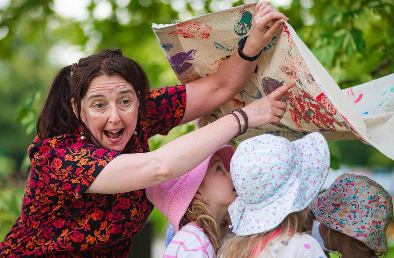 Storyteller Pyn performing with the young people as part of the Junction Arts Commission