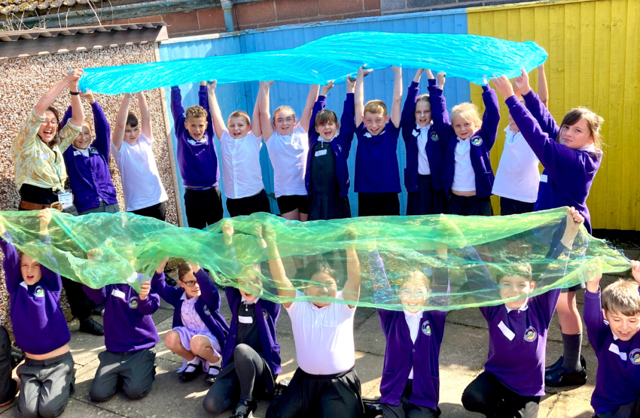 Pyn Stockman on the left with children from Skegness Primary School.